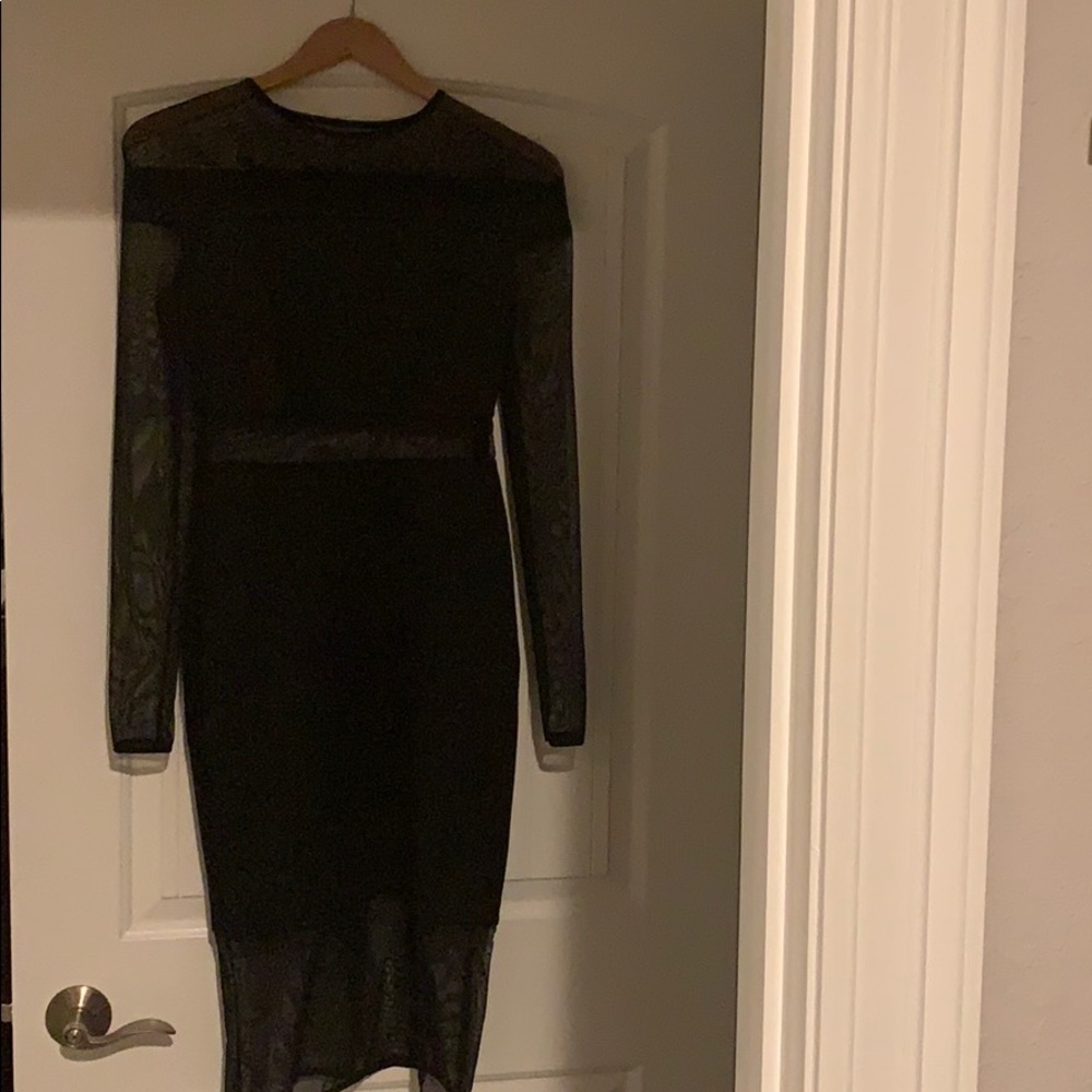 Little black dress.  Long sleeve, sheer cut outs!